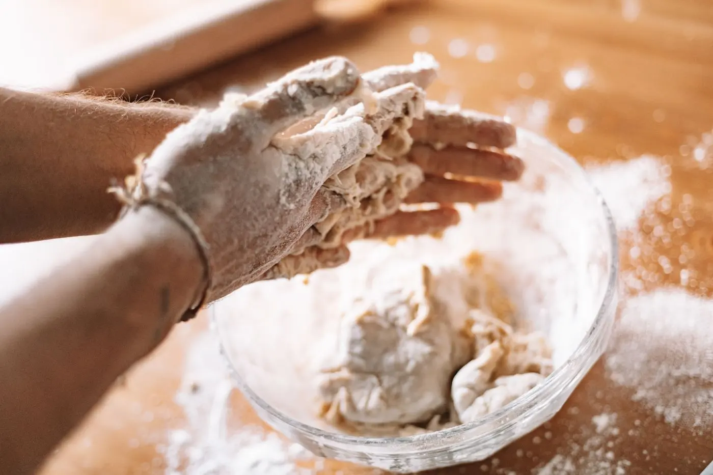 Shaping dough by hand