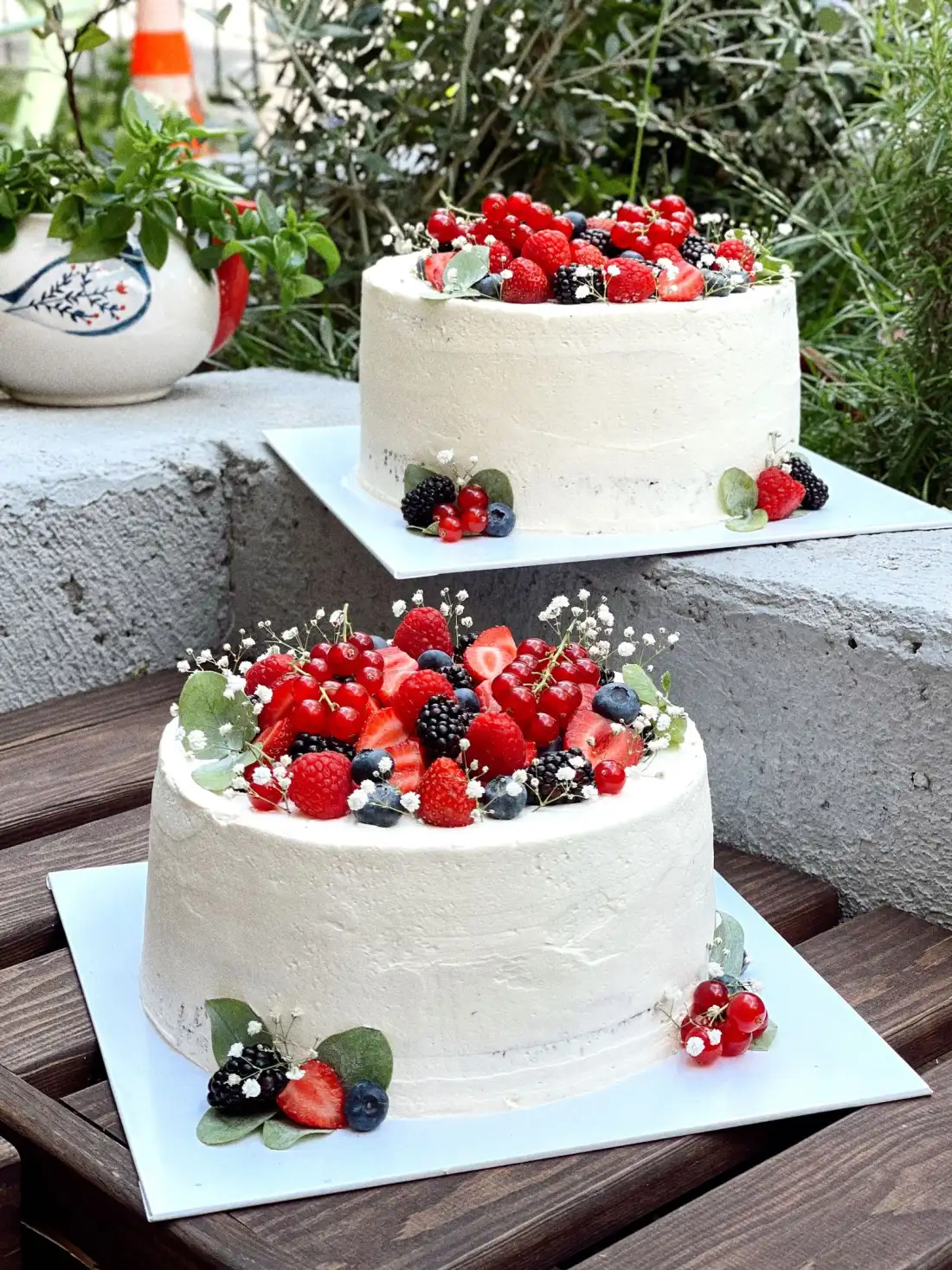 A finished celebration cake with fresh berries