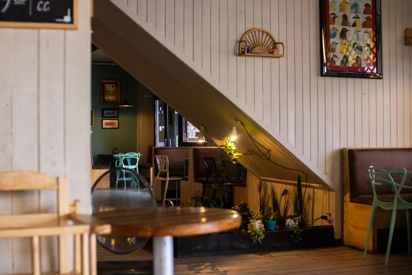 Tables under the stairs in the front room