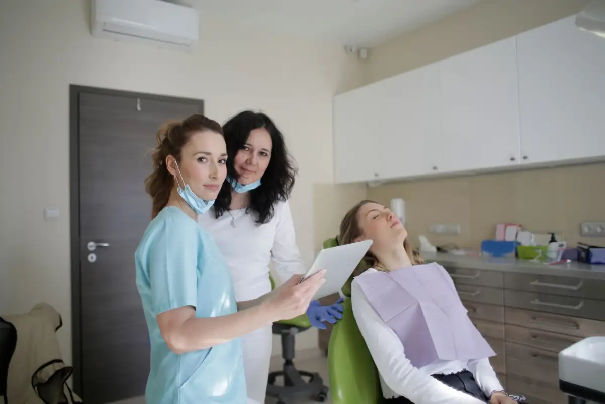 Two clinicians discussing a plan before an appointment
