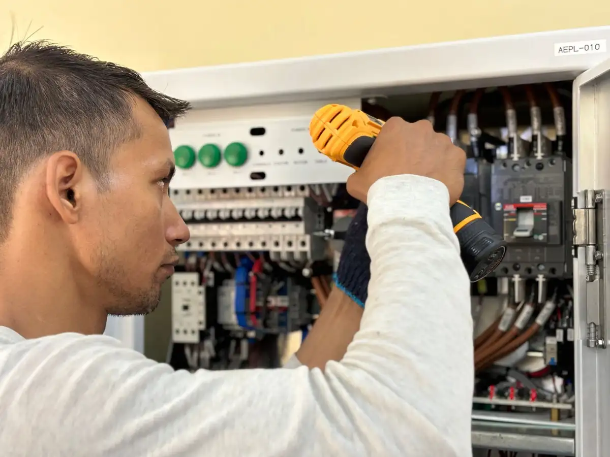 Working inside an opened breaker panel